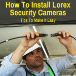 Man installing Lorex security cameras