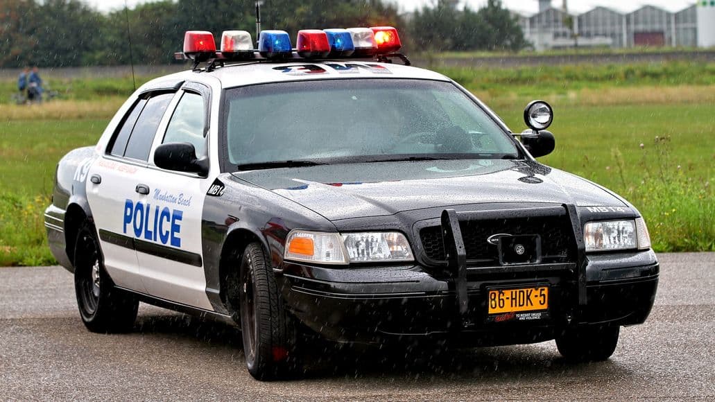 police car in rain