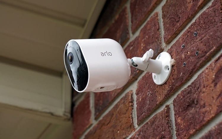 brick wall with security cam